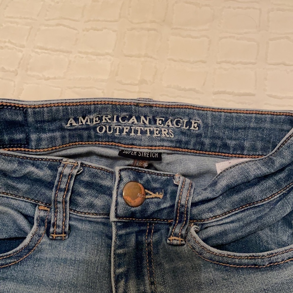 Medium Washed Distressed American Eagle Jeans - image 2